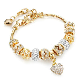 PULSEIRA PANDORA COM BERLOQUES CRAVEJADOS BANHADA EM OURO 18K - PL4314