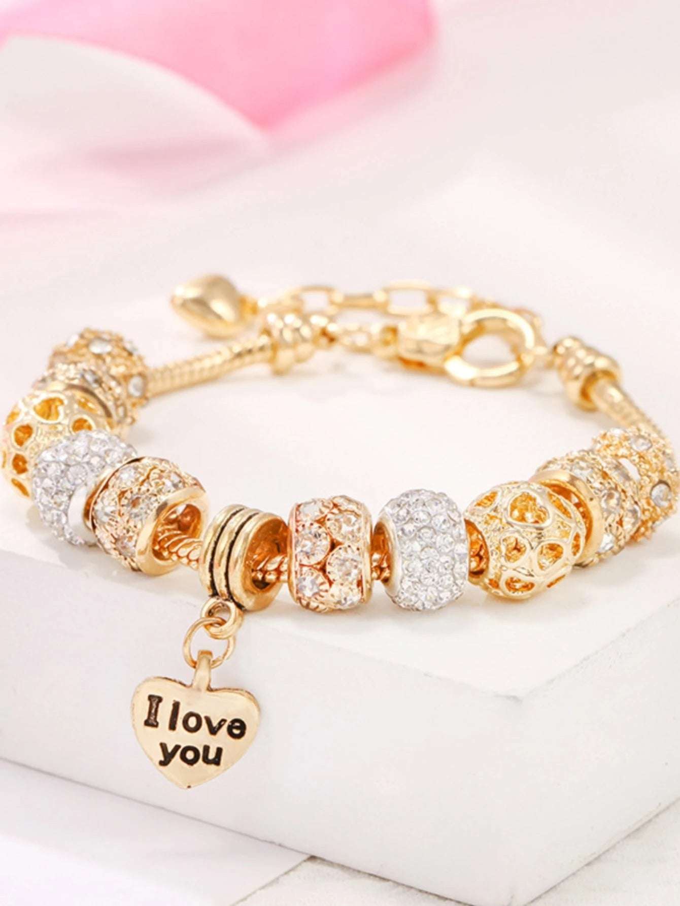 PULSEIRA PANDORA COM BERLOQUES CRAVEJADOS BANHADA EM OURO 18K - PL334