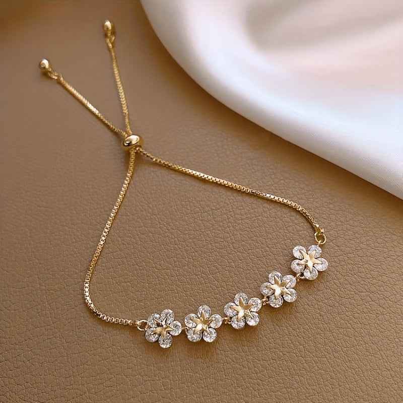 PULSEIRA FLORES BANHADA EM OURO 18K - PLSI 9421
