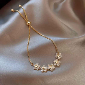 PULSEIRA FLORES BANHADA EM OURO 18K - PLSI 9421