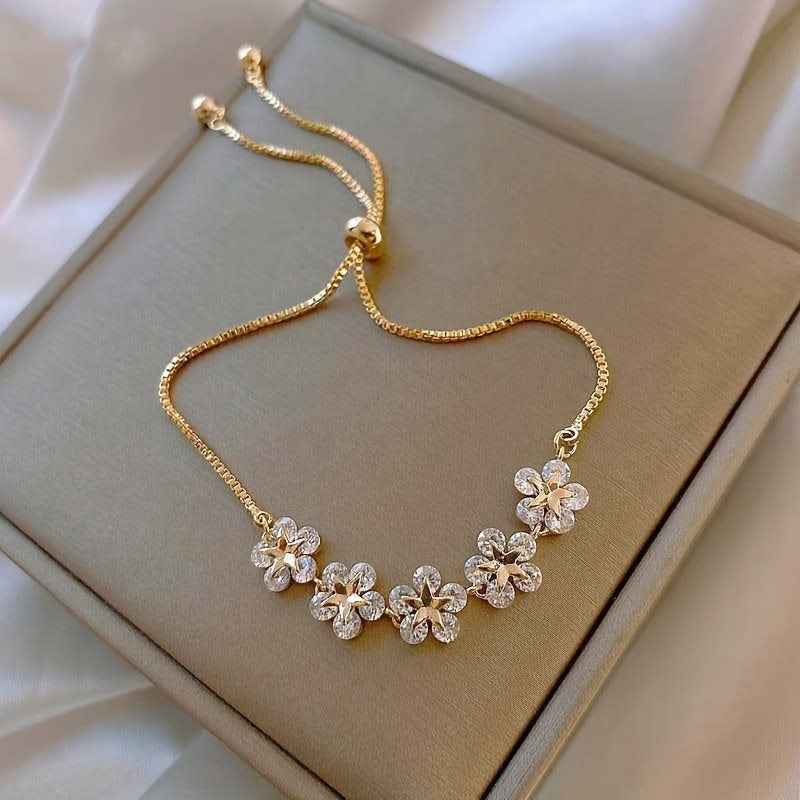 PULSEIRA FLORES BANHADA EM OURO 18K - PLSI 9421