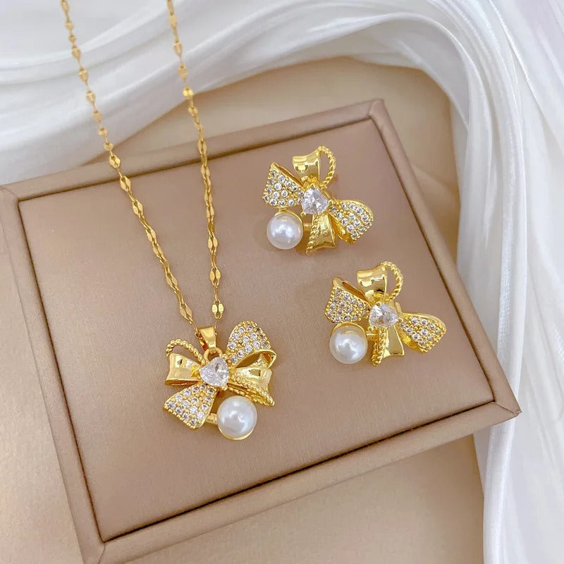 CONJUNTO LAÇOS E PÉROLAS BANHADO EM OURO 18K - CONJ242