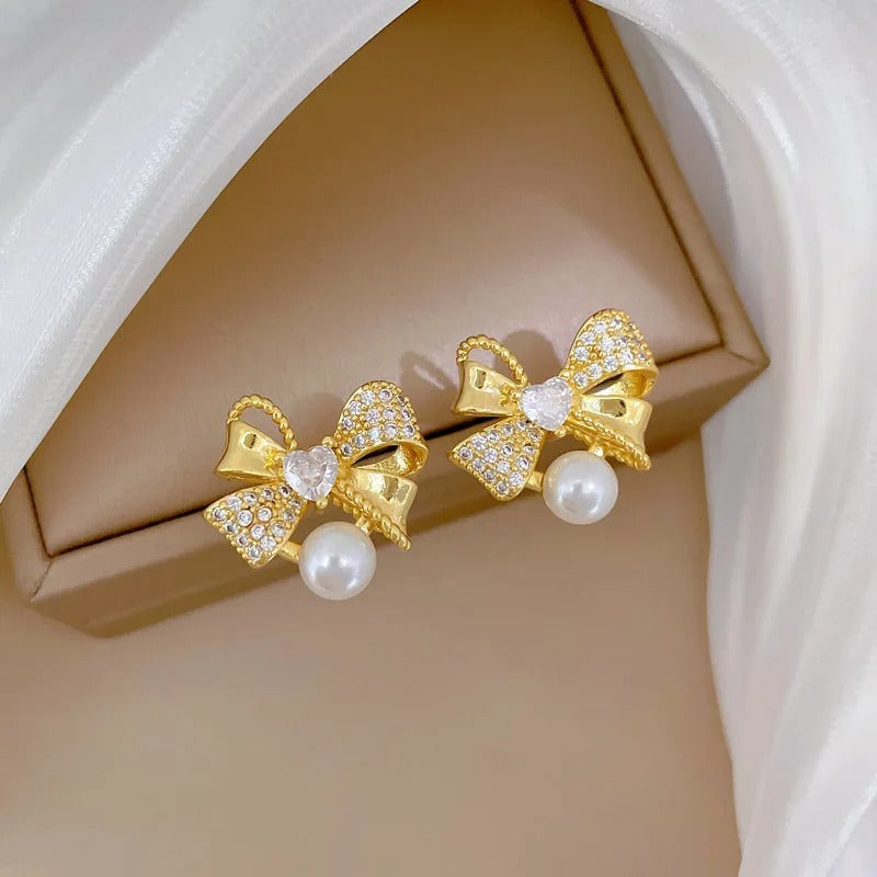CONJUNTO LAÇOS E PÉROLAS BANHADO EM OURO 18K - CONJ242