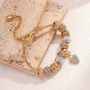 PULSEIRA PANDORA COM BERLOQUES CRAVEJADOS BANHADA EM OURO 18K - PL4314