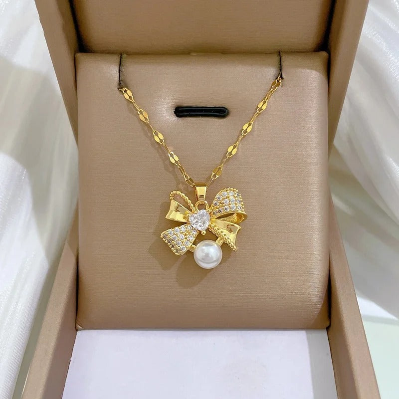 CONJUNTO LAÇOS E PÉROLAS BANHADO EM OURO 18K - CONJ242