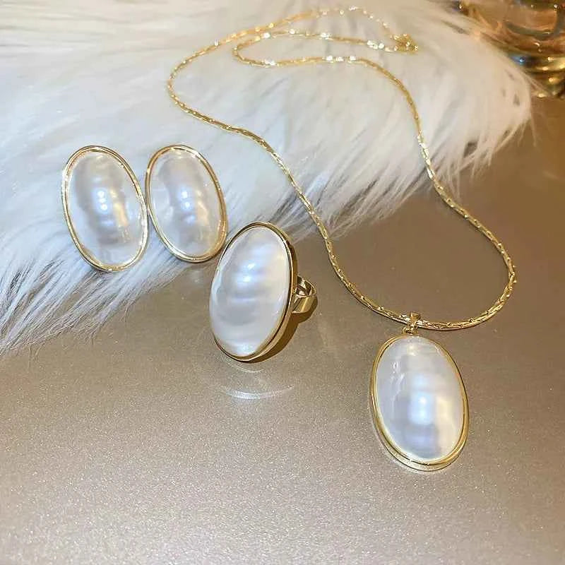 CONJUNTO PÉROLAS BANHADO EM OURO 18K - CONJ435