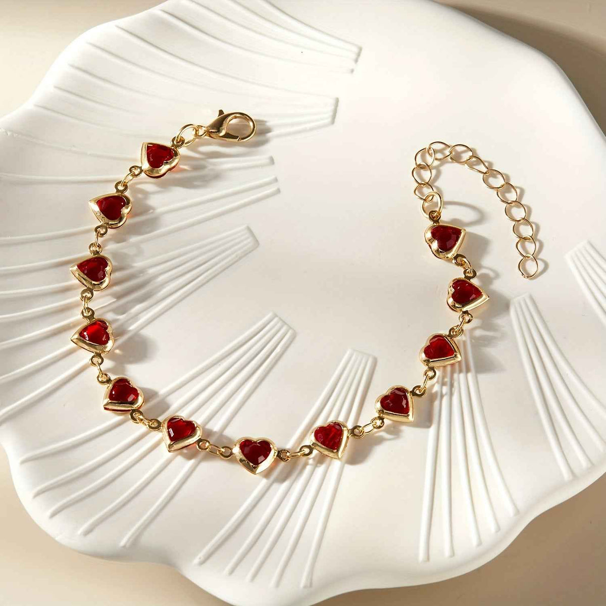 PULSEIRA CORAÇÕES BANHADA EM OURO 18K - PLSI 9477