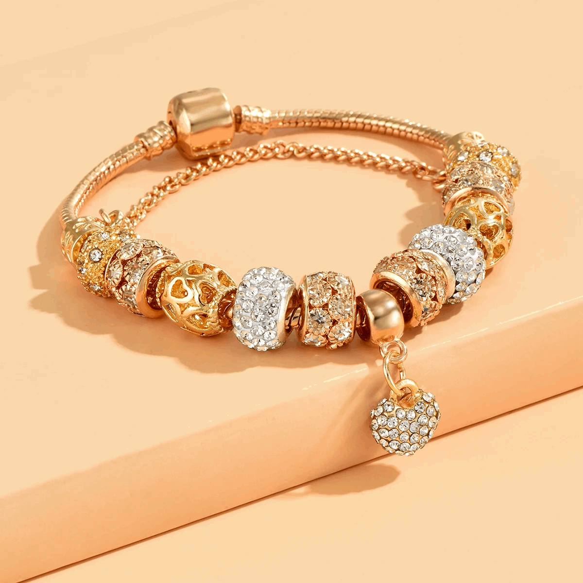 PULSEIRA PANDORA COM BERLOQUES CRAVEJADOS BANHADA EM OURO 18K - PL339