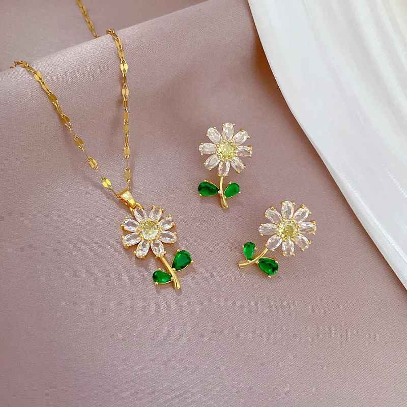 CONJUNTO FLORES BANHADO EM OURO 18K - CONJ8312